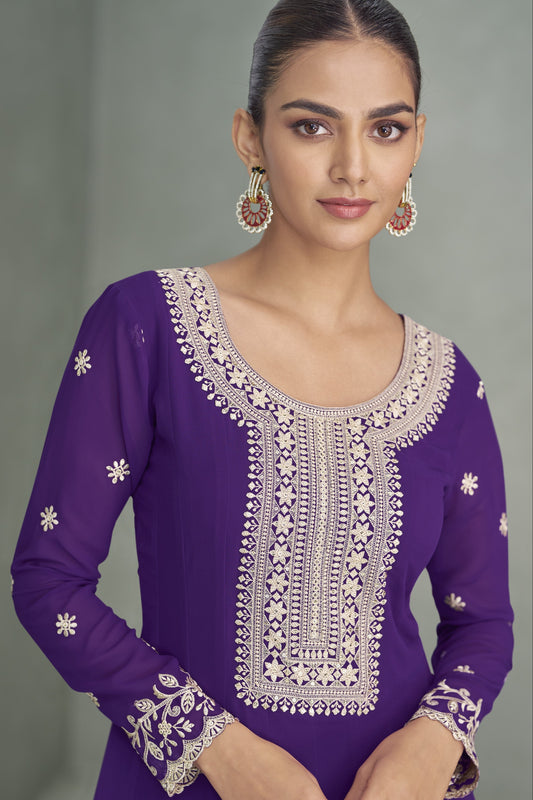 Purple color Anarkali gown in georgette fabric with sequin and embroidery work, showcasing a regal and graceful look ideal for weddings and parties.