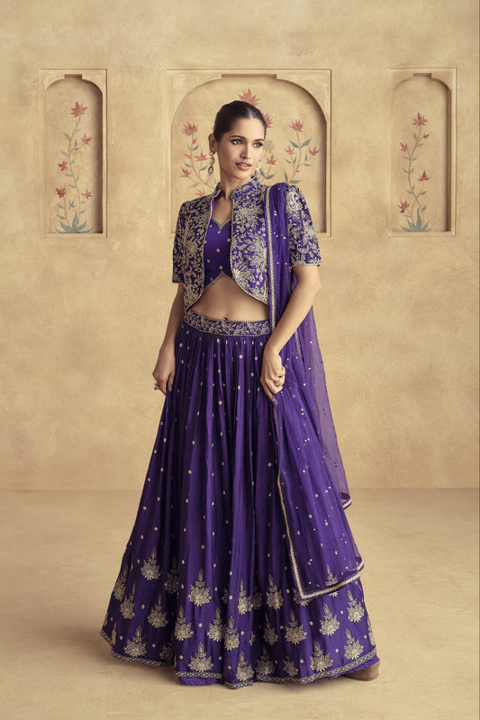 Elegant designer lehenga in rich fabric, featuring detailed work for bridal and party wear.