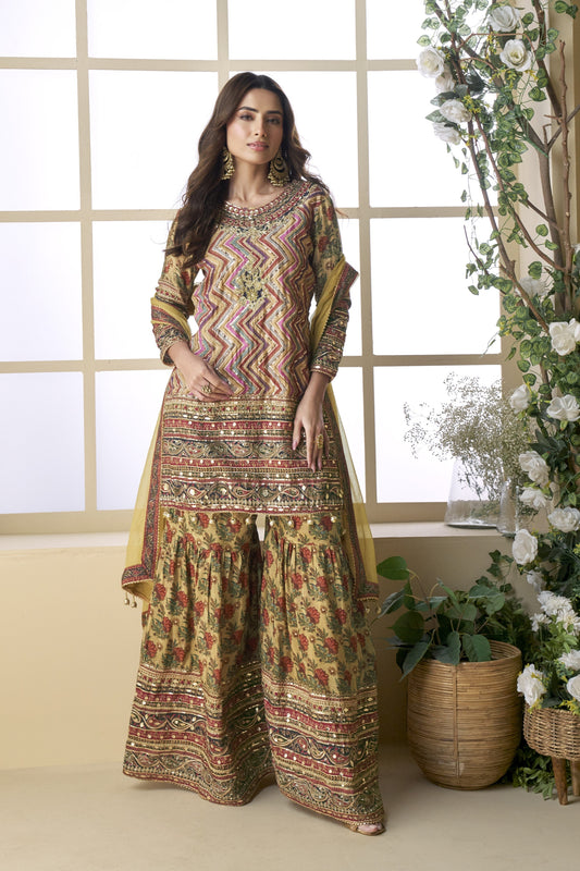 Light yellow color palazzo sharara in viscose silk fabric with hand zari work and embroidery work, bringing a soft, radiant elegance perfect for festive and celebratory occasions.