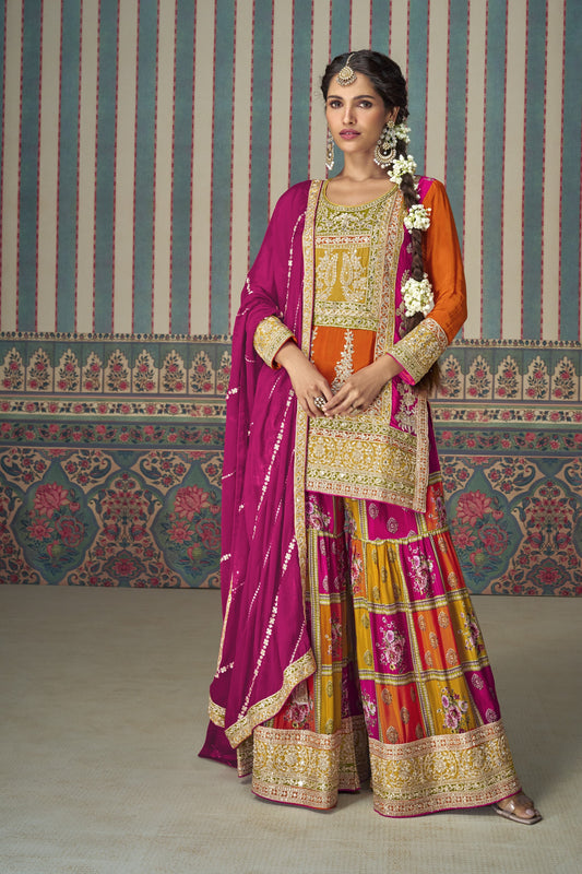 Orange color palazzo suit in Chinon silk fabric with embroidery work, showcasing vibrant elegance perfect for festive celebrations and traditional gatherings.