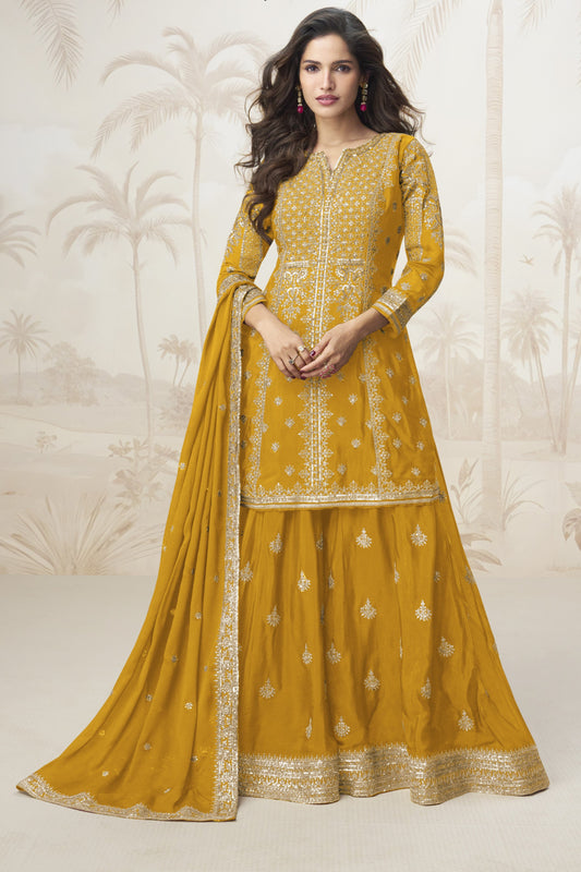 Yellow color palazzo suit in Chinon silk fabric with embroidery work, radiating bright festive energy with a traditional flair.