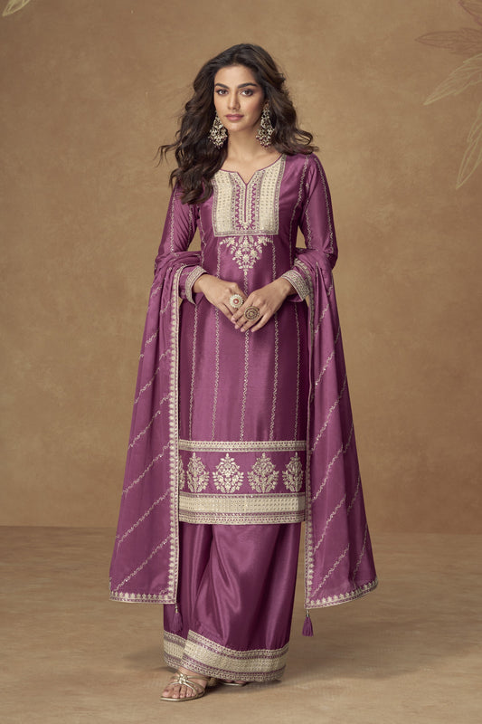 Mulberry pink color palazzo suit in Chinon silk fabric with embroidery work, offering a rich and elegant look for festive gatherings.