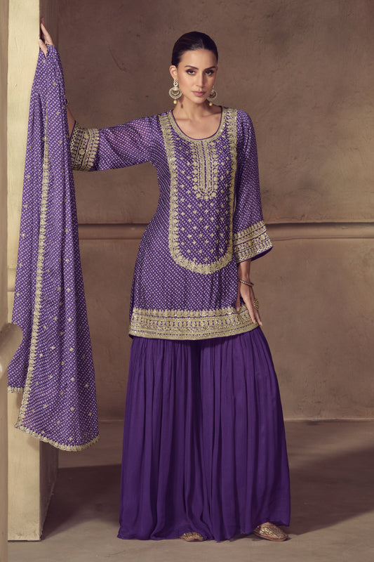 Purple color palazzo suit in Chinon fabric with embroidery work, offering a regal and graceful look perfect for festive occasions.