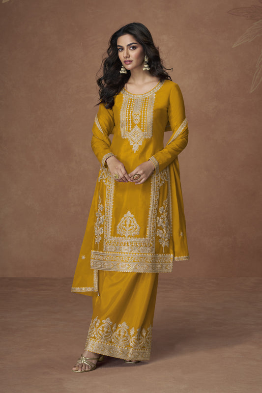 Yellow color palazzo suit in Chinon silk fabric with embroidery work, radiating bright and joyful charm perfect for cultural occasions.
Ask ChatGPT