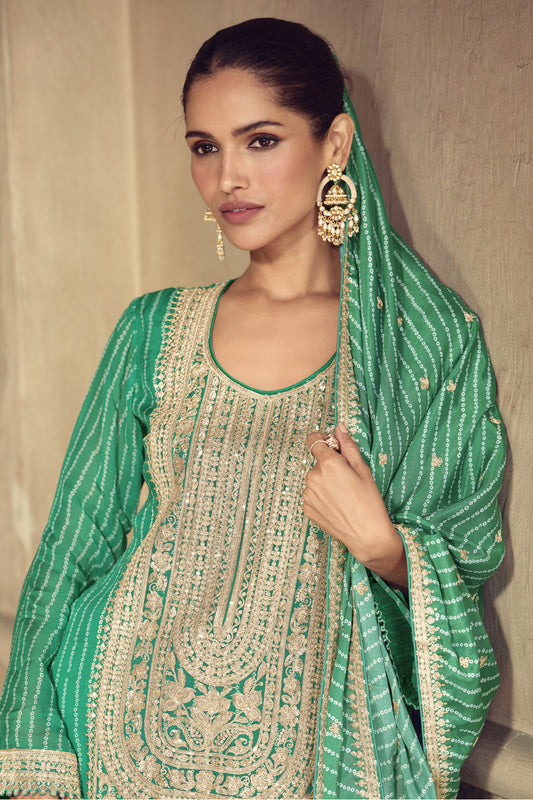 Green color palazzo suit in Chinon fabric with embroidery work, featuring fresh tones and classic detailing for a refined ethnic look.