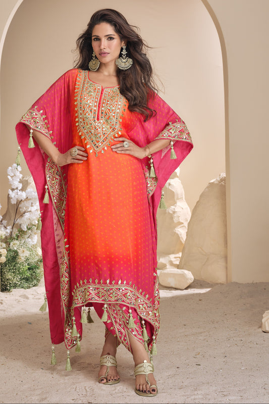 Orange color palazzo suit in viscose silk with radiant mirror work and embellished details, perfect for vibrant and joyful celebrations.
Ask ChatGPT