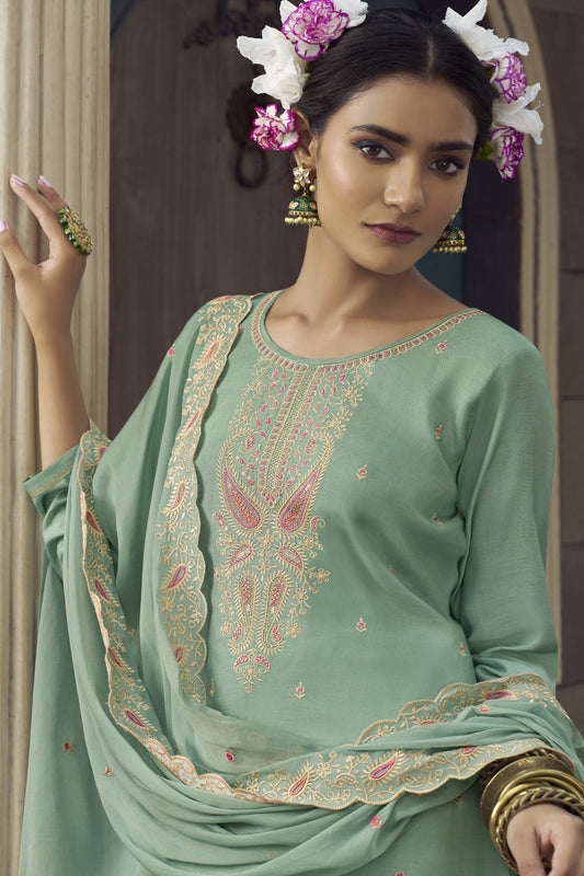 Green Salwar Kameez – perfect for Mehndi nights, family events, and joyful occasions.