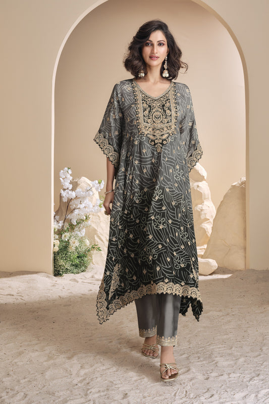 Black color palazzo suit in viscose silk, highlighted with intricate mirror and embellished work for a bold and sophisticated festive look.
