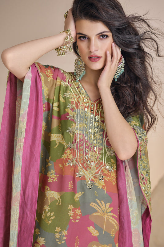 Mulberry pink color palazzo suit in viscose silk with mirror work and embellished detailing, bringing a rich and stylish charm to your festive wardrobe.