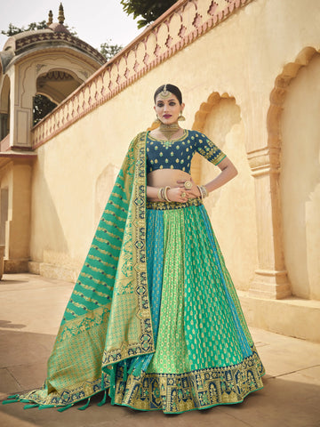 Tempiting Rama Pista Firozi Color Banarasi Silk Fabric Reception Wear Lehenga Choli