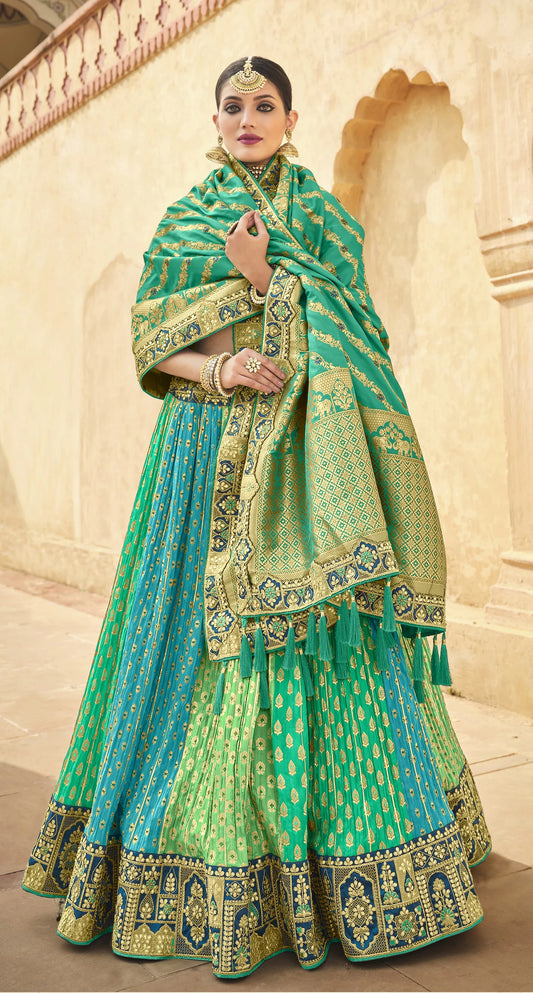 Tempiting Rama Pista Firozi Color Banarasi Silk Fabric Reception Wear Lehenga Choli