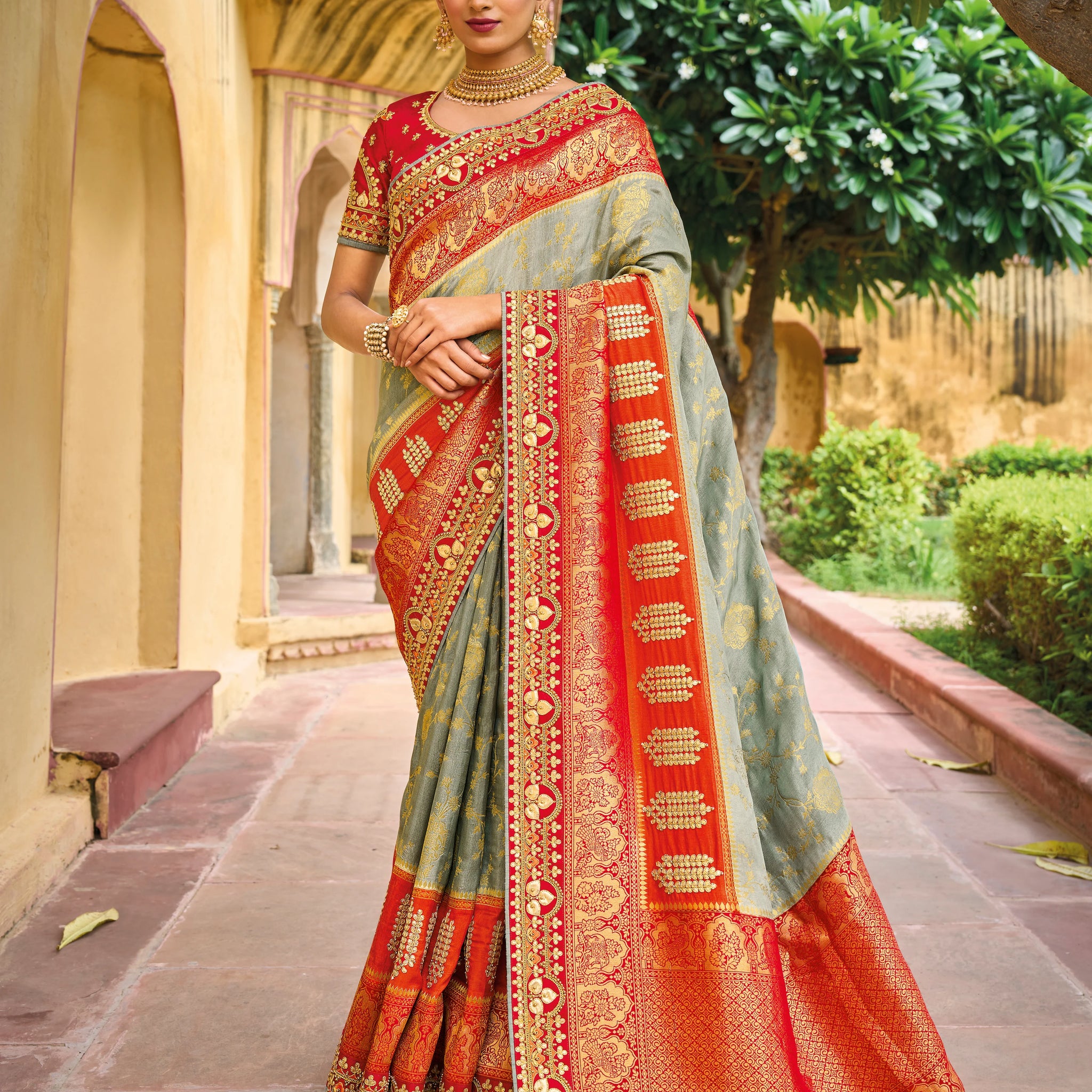 Gorgeous Grey Orange Color Pure Dola Viscose Trendy Style Engagement Wear Saree