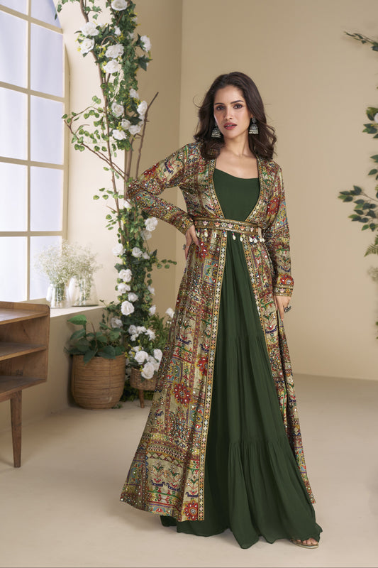 Dark green color Anarkali gown in georgette and silk fabric with embellished work, showcasing a rich and elegant look perfect for festive and wedding celebrations.
