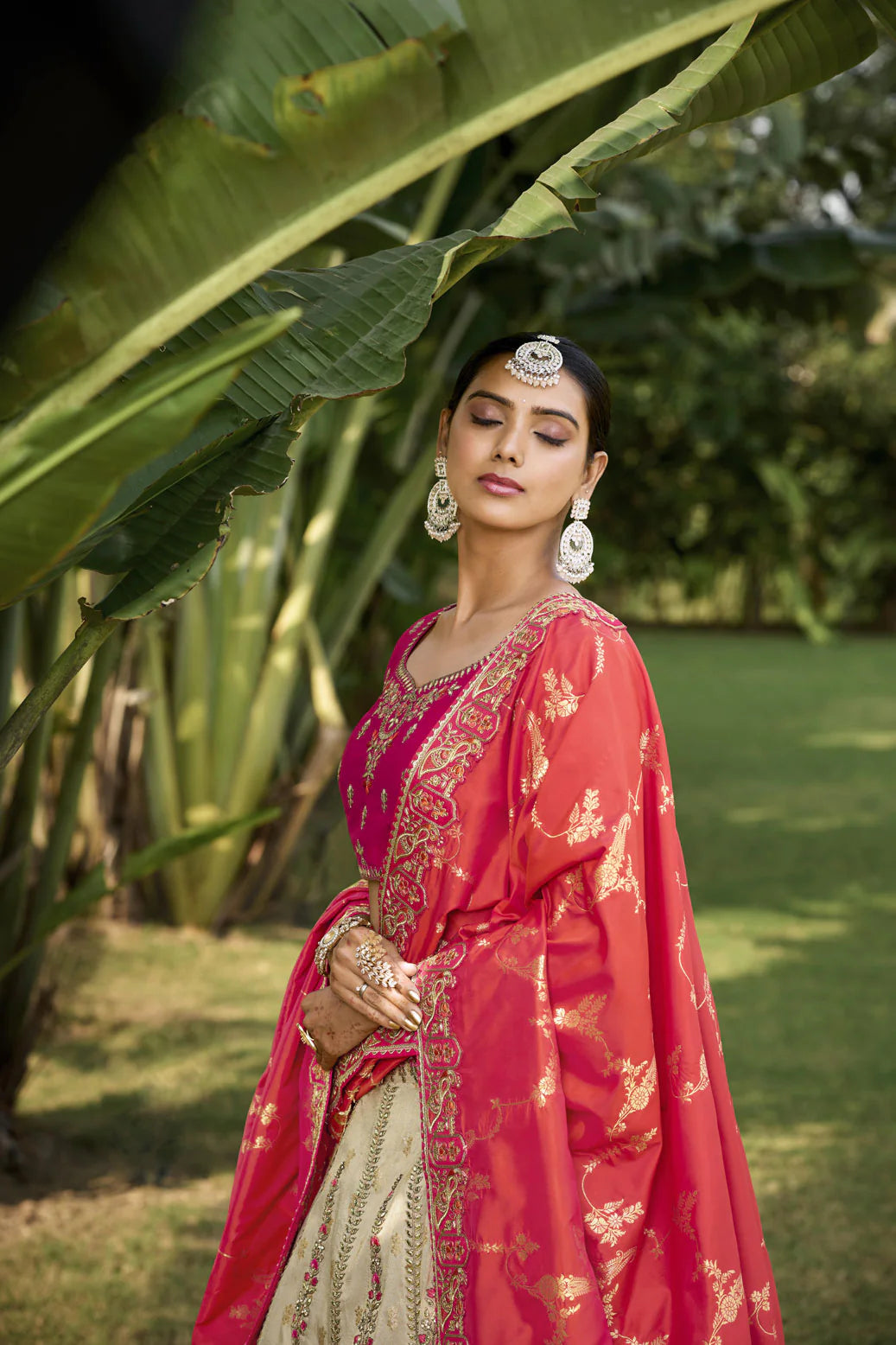 Pakistani Designer Wedding Wear Off-Rani Color Stitched Lehenga Choli
