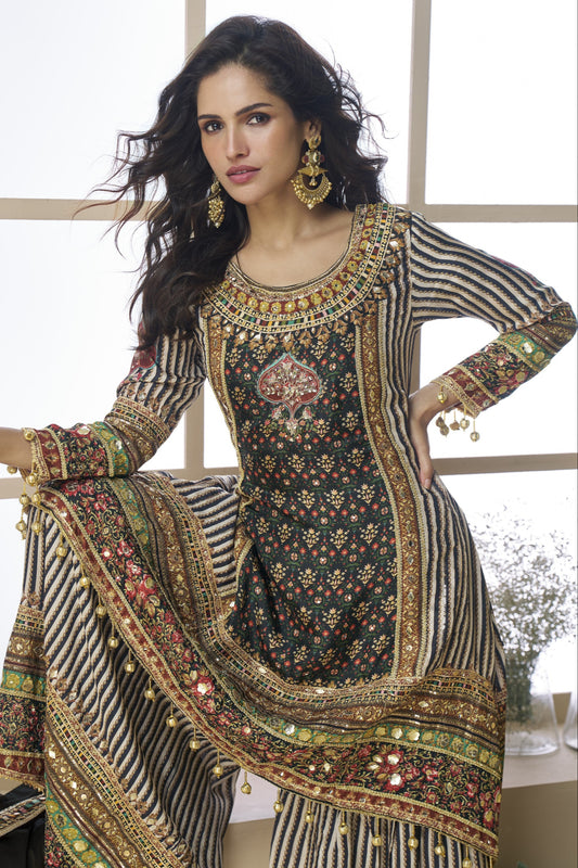 Black color palazzo sharara in viscose silk fabric with hand zari work and embroidery work, exuding bold elegance and rich traditional charm for festive events.
