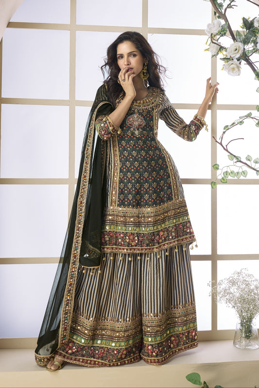 Black color palazzo sharara in viscose silk fabric with hand zari work and embroidery work, exuding bold elegance and rich traditional charm for festive events.
