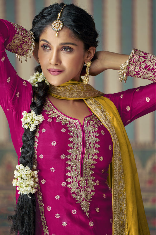 Pink color palazzo suit in Chinon silk fabric with embroidery work, offering a graceful and elegant look ideal for festive and special occasions.
