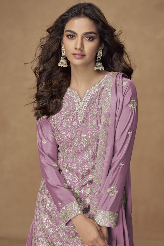 Mulberry pink color palazzo suit in Chinon fabric with embroidery work, showcasing rich elegance and feminine charm ideal for special occasions.

