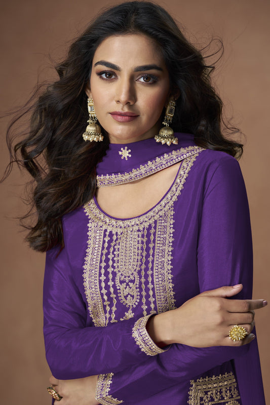 Purple color palazzo suit in Chinon silk fabric with embroidery work, bringing a regal and graceful touch to traditional celebrations.

