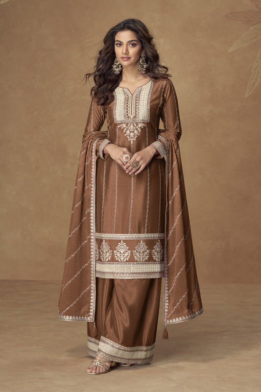 Brown color palazzo suit in Chinon silk fabric with embroidery work, showcasing warm tones and traditional charm for festive celebrations.