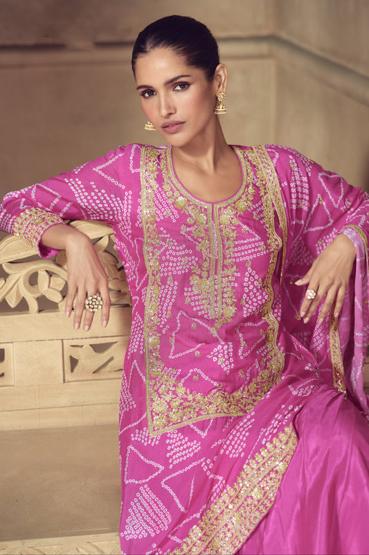 Pink color palazzo suit in Chinon fabric with embroidery work, showcasing a soft and elegant charm ideal for traditional events.

