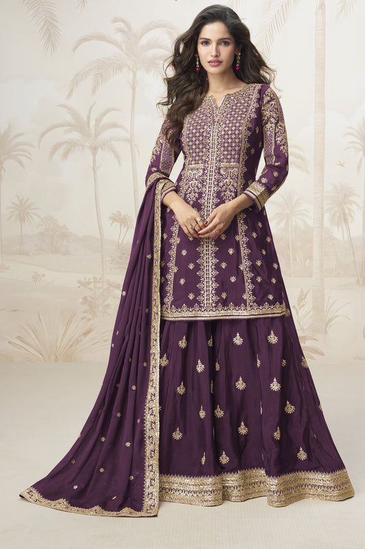 Wine color palazzo suit in Chinon silk fabric with embroidery work, offering a rich and regal look ideal for festive and evening occasions.

