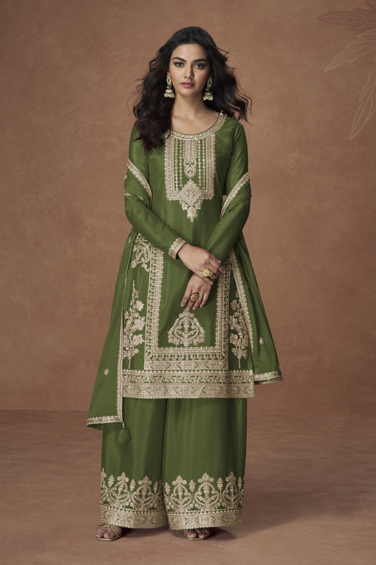 Green color palazzo suit in Chinon silk fabric with embroidery work, offering a fresh and elegant look ideal for festive wear.

