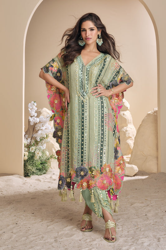 Light green color palazzo suit in viscose silk fabric with shimmering mirror and embellished accents, offering a fresh and graceful appearance for special occasions.

