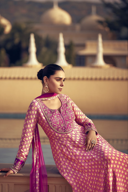 Light pink color palazzo suit in premium Chinon silk with delicate embroidery work, bringing a soft and graceful charm to your ethnic wardrobe.

