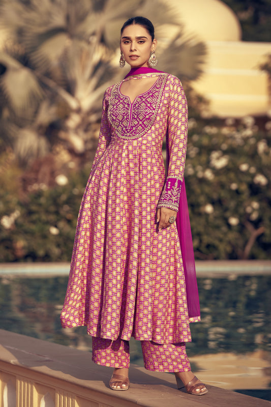 
Light pink color palazzo suit in premium Chinon silk with delicate embroidery work, bringing a soft and graceful charm to your ethnic wardrobe.

