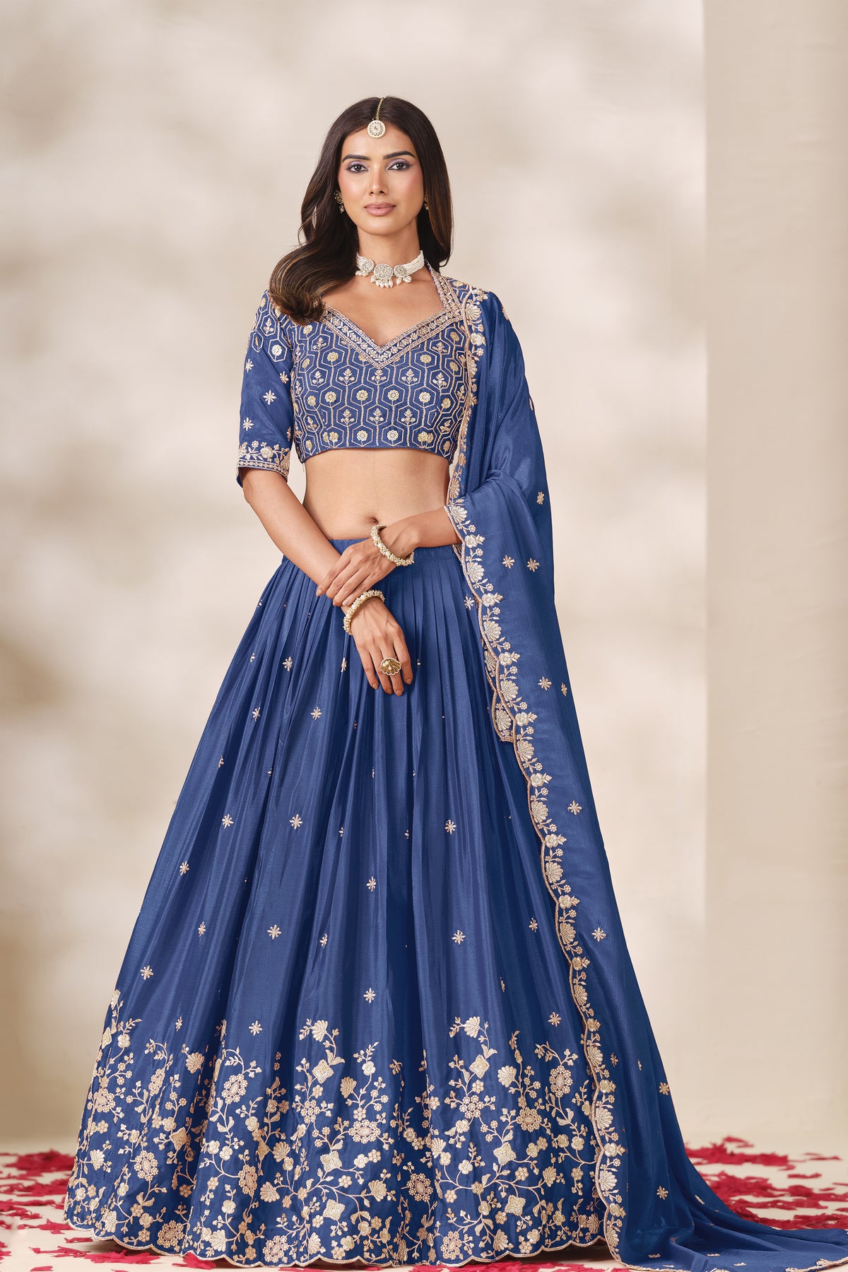 Blue lehengha choli for women's with heavy embroidery, front view.