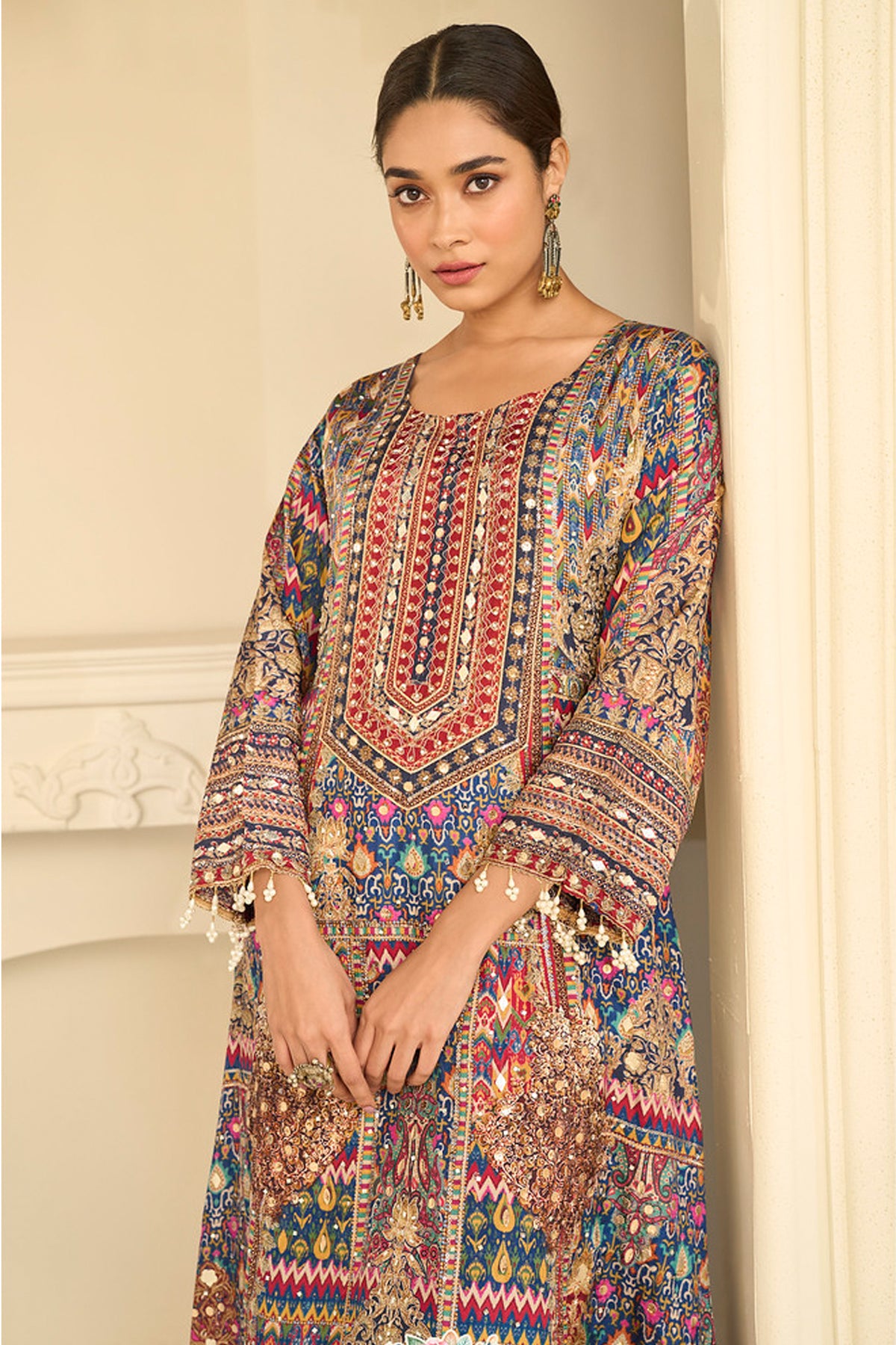 Gota Patti work detail on the blue kameez
