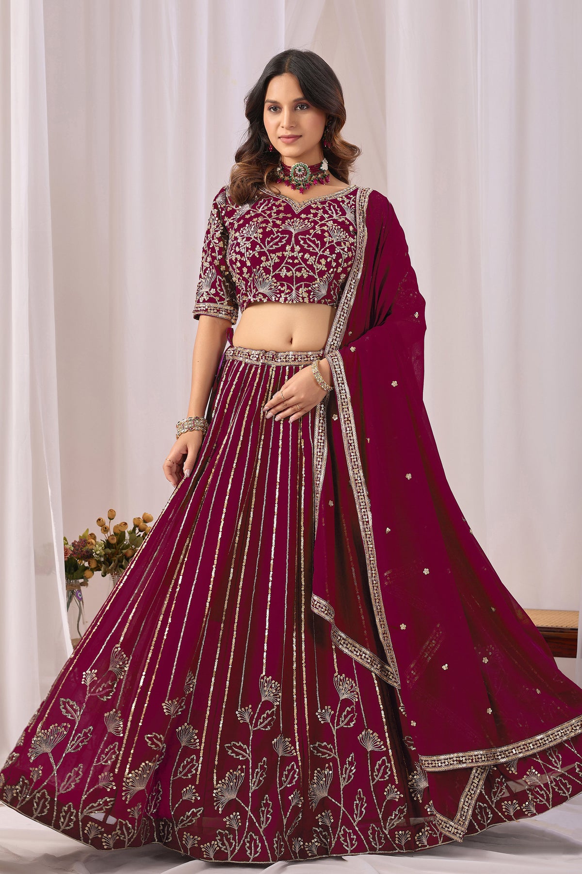 Burgundy red lehenga choli outfit for engagement celebrations
