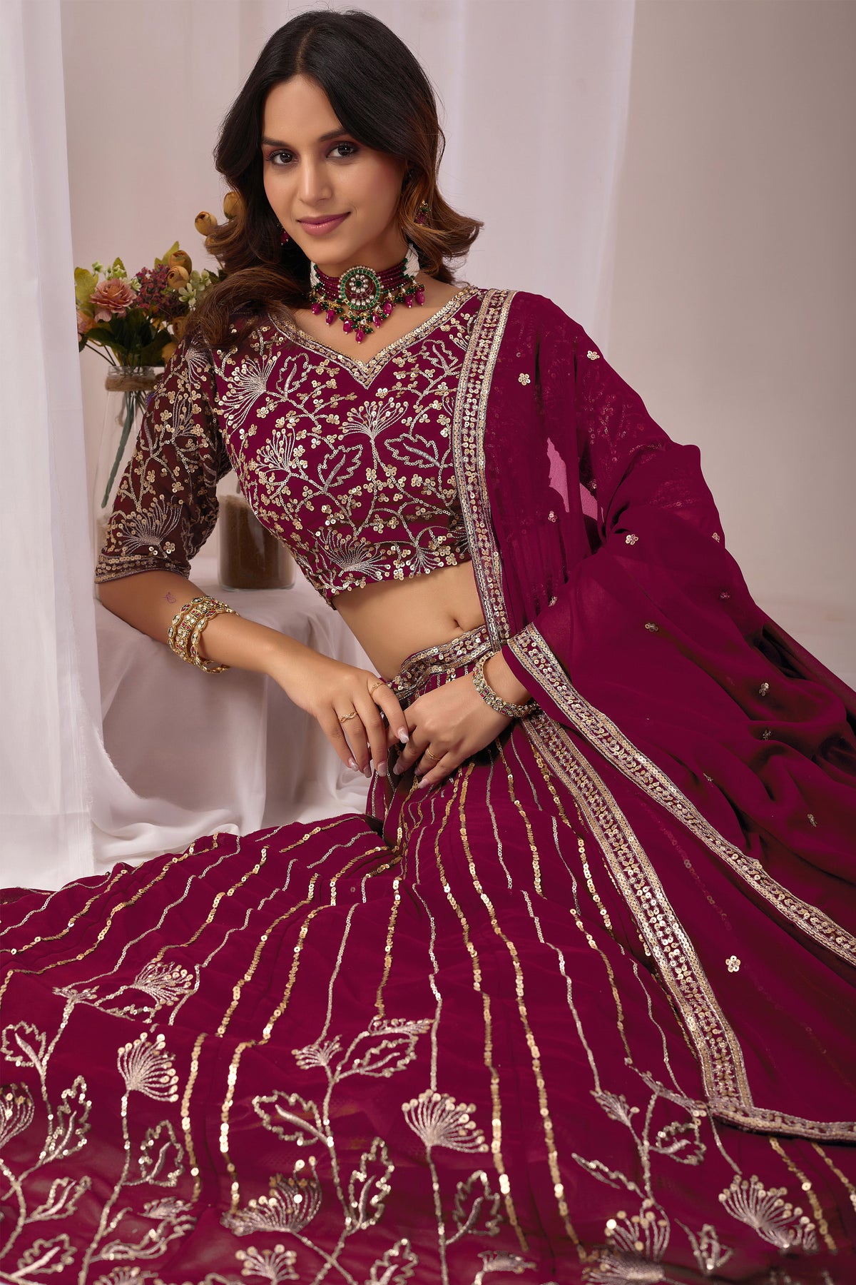 Sequin work detail on the burgundy red lehenga choli outfit