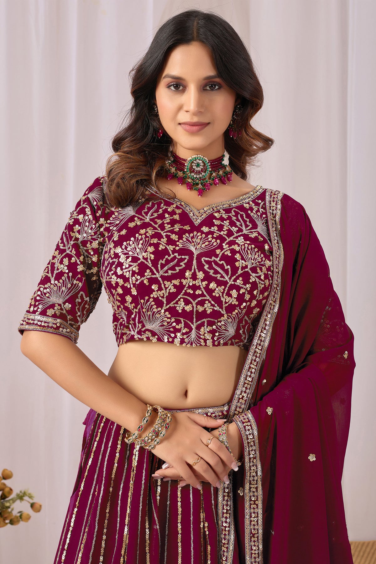 Burgundy red anniversary wear with heavy embroidery and sequin work