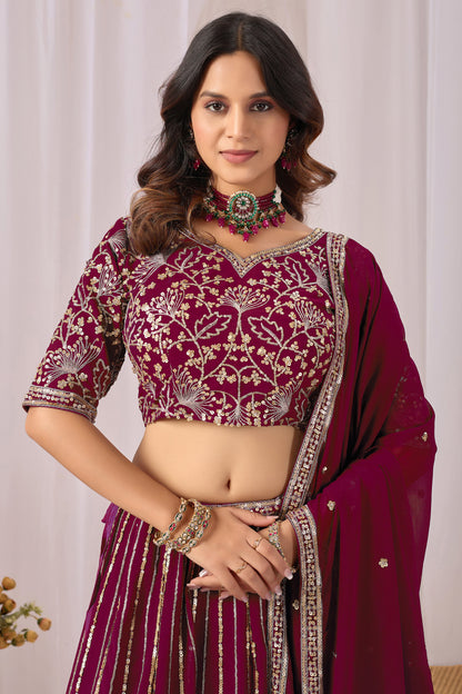 Burgundy red anniversary wear with heavy embroidery and sequin work
