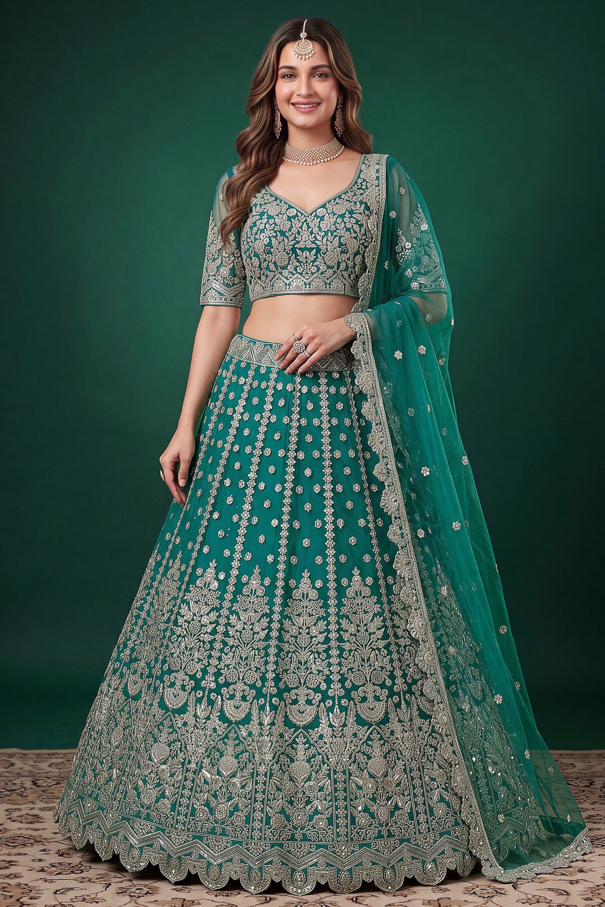 Teal blue lehenga choli front view with embroidered blouse and dupatta