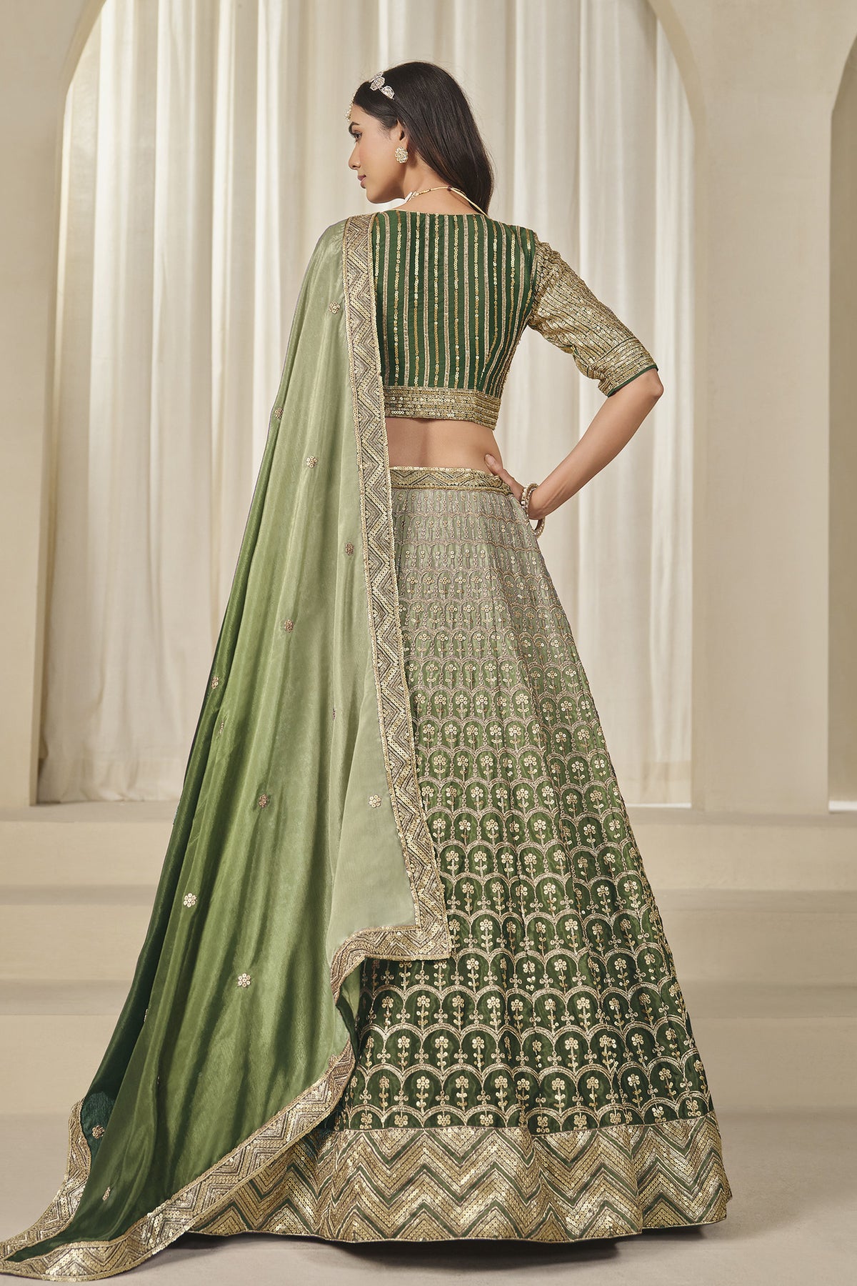 Green Chinon silk lehenga choli with heavy sequin embroidery