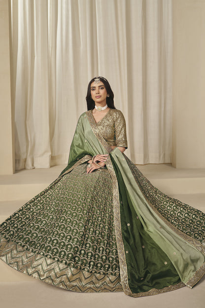 Green lehenga skirt with all-over embroidery and geometric hem border