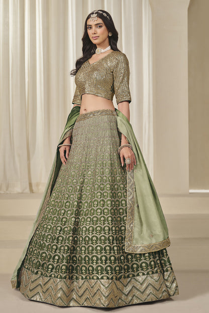 Green Chinon silk lehenga with detailed embroidered skirt border