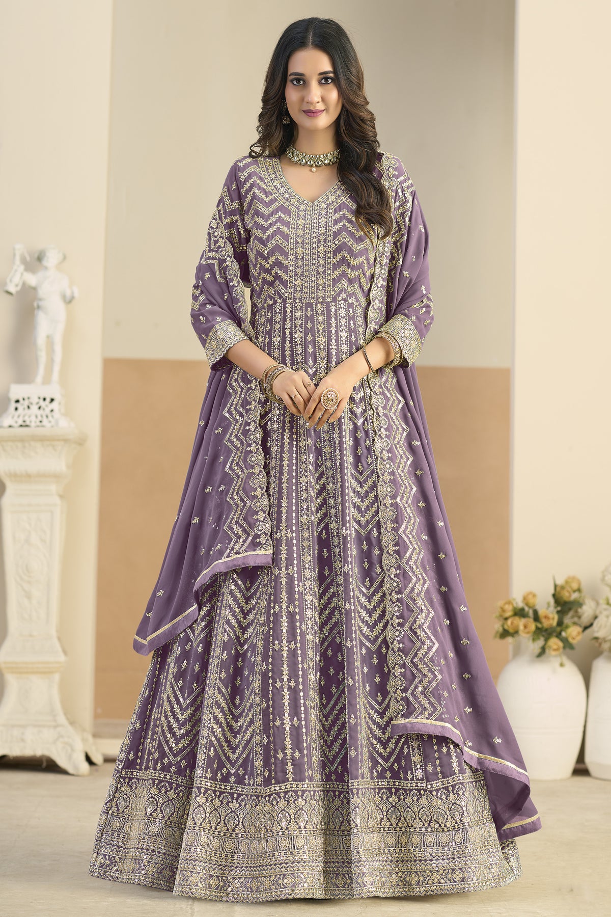 Sleeve detail with embroidery on lavender anarkali gown
