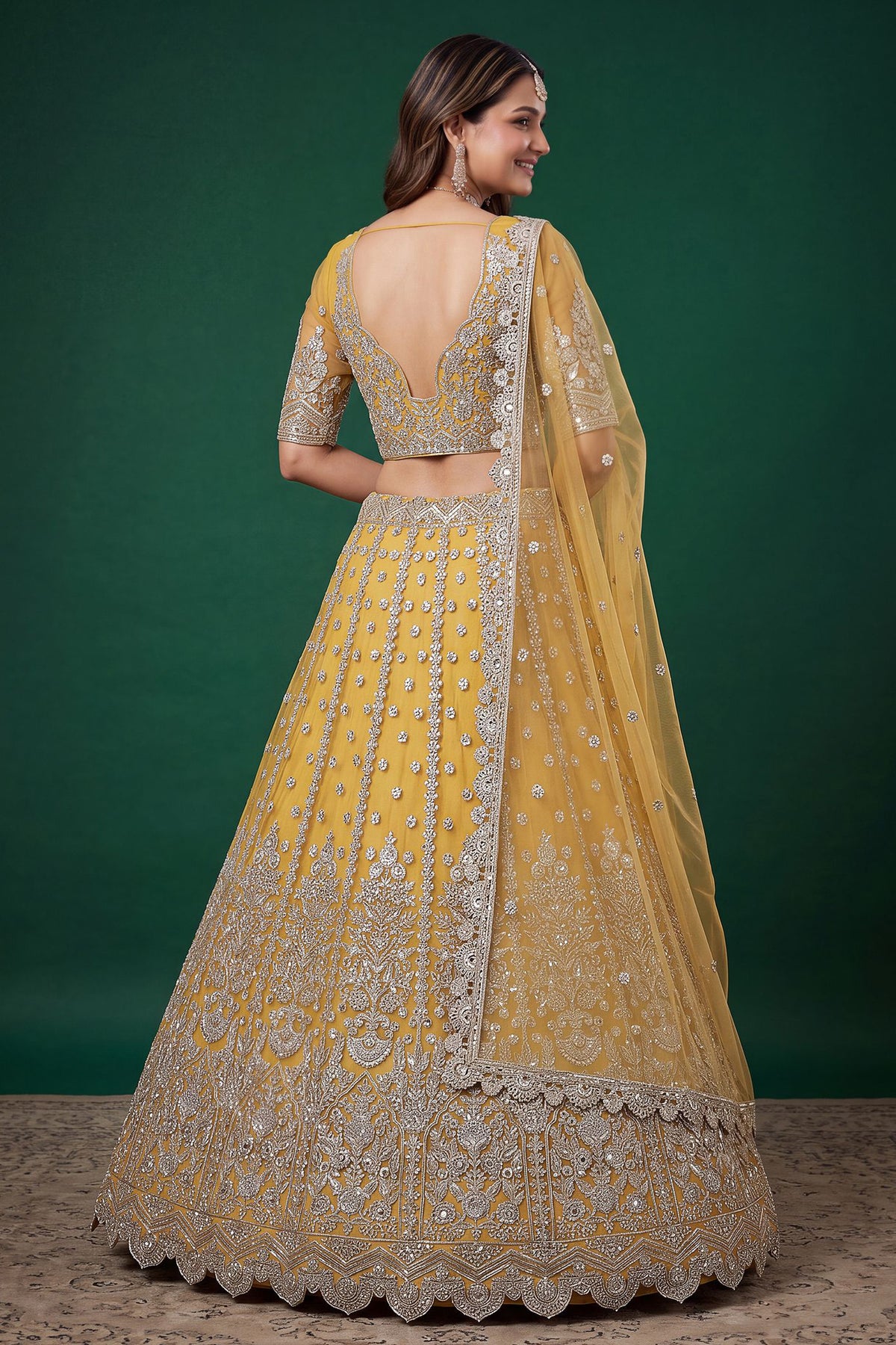 Lehenga and choli back view with embroidered detailing