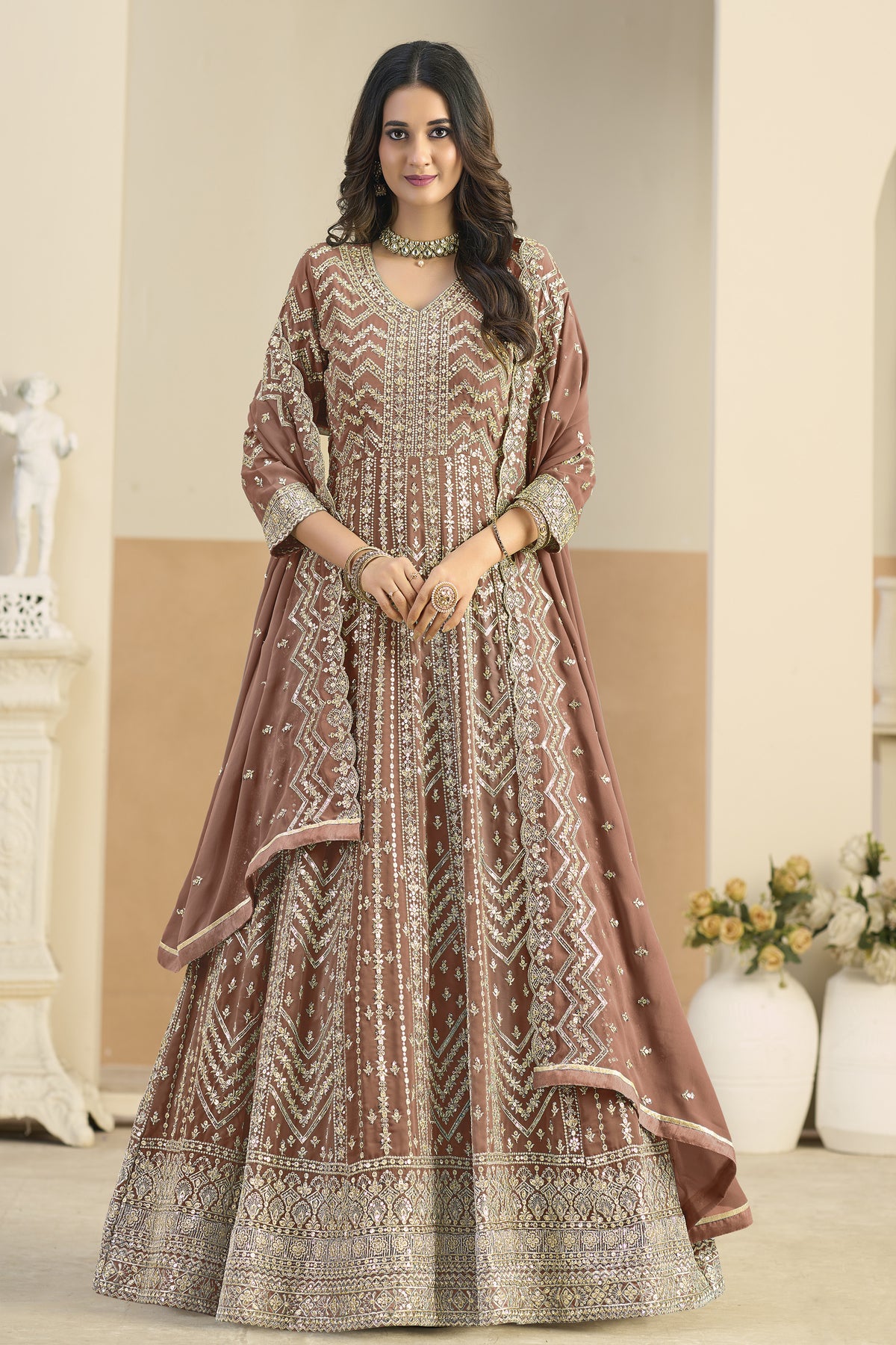 Close-up of embroidery work on light brown anarkali neckline