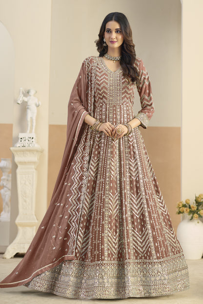 Light brown anarkali salwar suit with heavy embroidery, front view