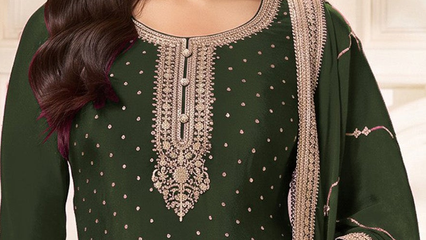 Sequence and coding embroidery close-up on mehandi green neckline