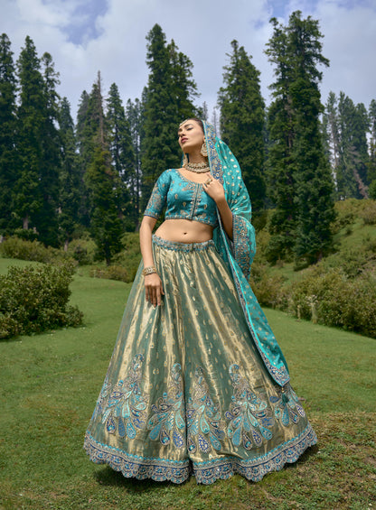 Charming Gold Color Festival Wear Lehenga Choli With Orgenza Dupatta