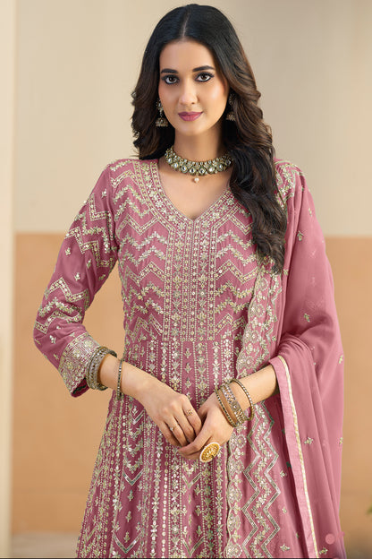 Heavy embroidery work close-up on pink anarkali neckline