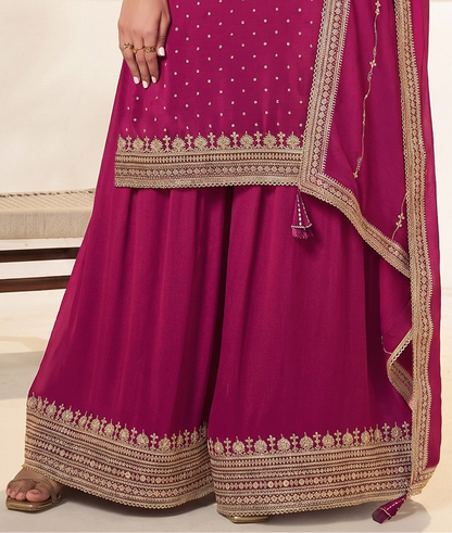 Back view of pink stitched dupatta dress with border embroidery