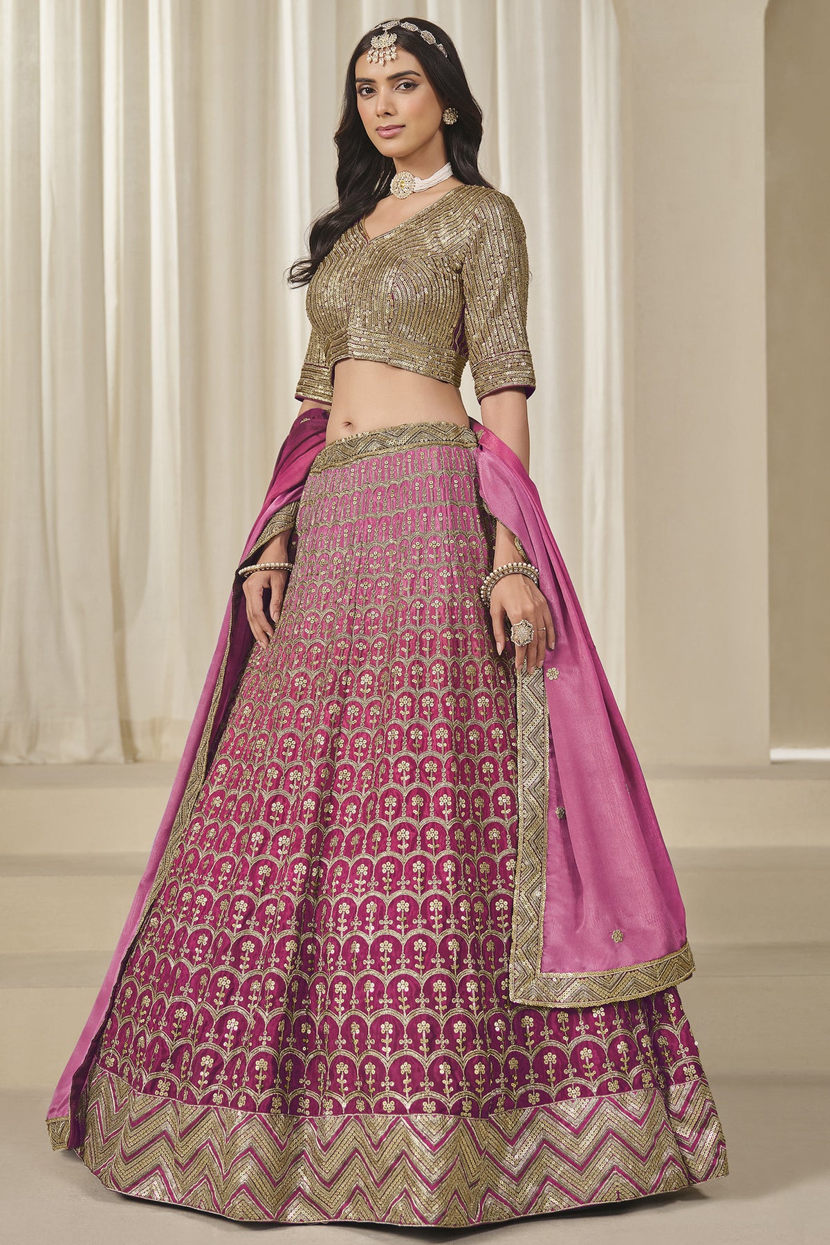 Pink Chinon silk lehenga with detailed embroidered skirt border