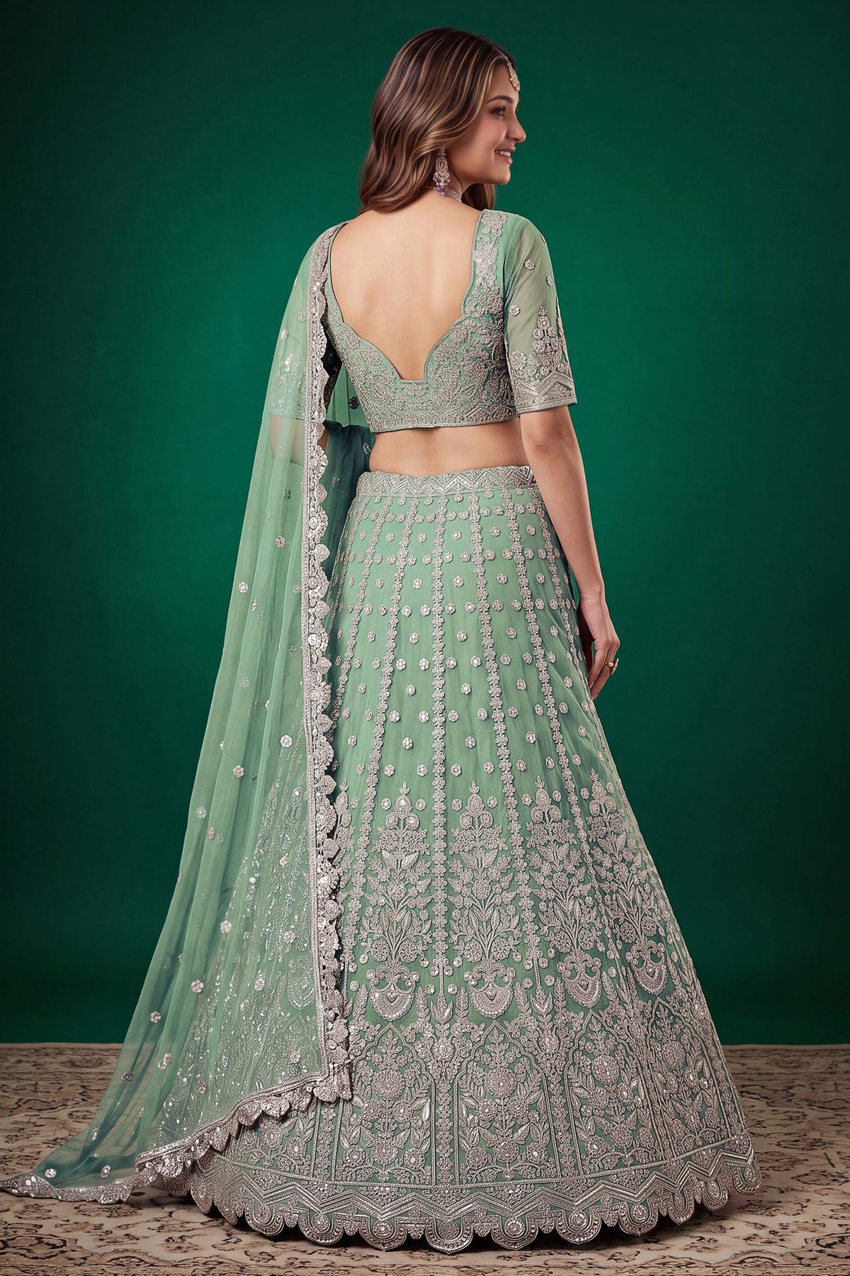Pistachio green lehenga and choli with zari and dori embroidery